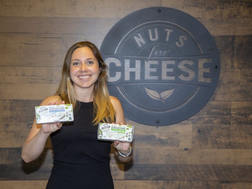 Margaret Coons, CEO and Founder of Nuts for Cheese holding up her product Nuts for Butter, an organic and dairy free butter made out of cultured cashews.