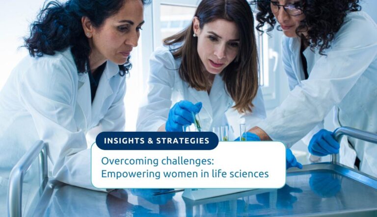 Overcoming challenges Empowering women in life sciences. Three diverse women researchers in a lab environment carefully arrange plant samples in vials on a test tube rack.