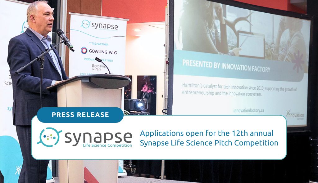 David Carter, CEO of Innovation Factory, giving a speech at the annual Synapse Life Science Pitch Competition 2024. English text reads "Applications open for the 12th annual Synapse Life Science Competition".