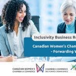 Inclusivity Series: Canadian Women’s Chamber of Commerce - Forwarding Women Background image of a diverse group of business women sitting down for a meeting in an office setting.